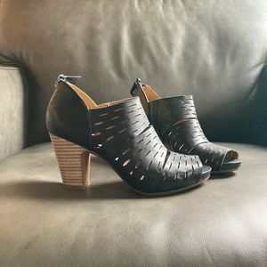 Black Clarks open toe bootie with brown heel